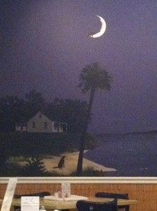 The infamous painting adorning the wall of the dining room at Moondoggies