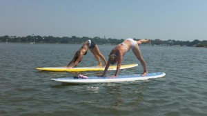 Vivi Verity, paddleboarding instructor says, “I'd say you can paddle and have your cake too. There are lots of exercises you can do on a board, like yoga.” Photo courtesy Brian Good