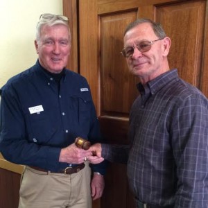 Dick Hoagland, left, director of Therapy Dogs International's Beaufort Chapter No. 229, passed the gavel to new Director Russ Dimke on Saturday.