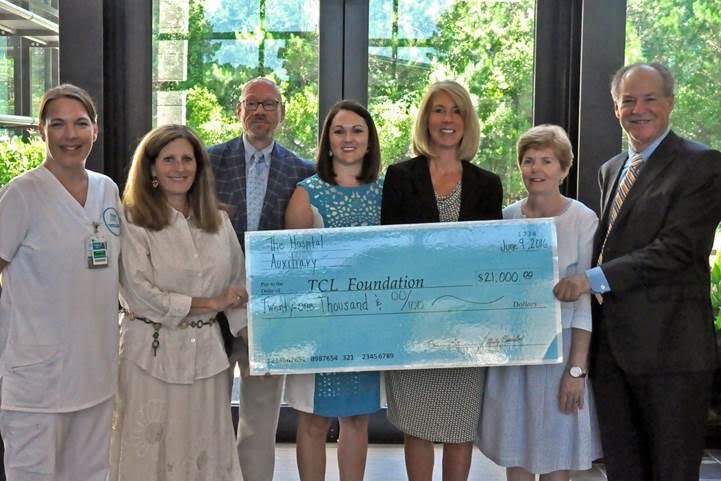 Hospital Auxiliary presents scholarship funds to TCL